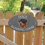 Picture of Dogs Running Loose Sign