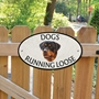Picture of Dogs Running Loose Sign