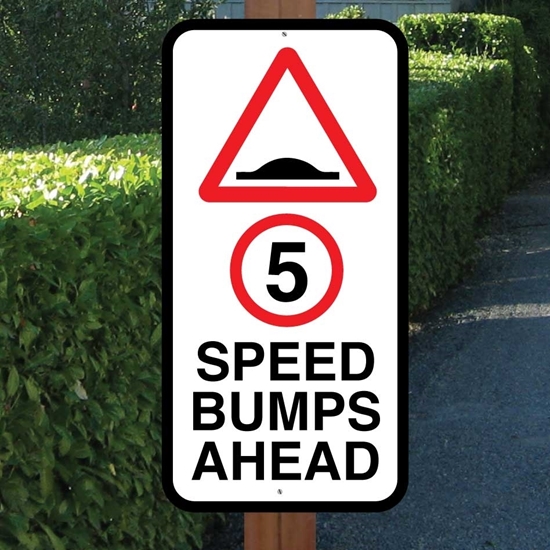 Picture of Speed Bumps Slow Down Sign