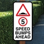 Picture of Speed Bumps Slow Down Sign