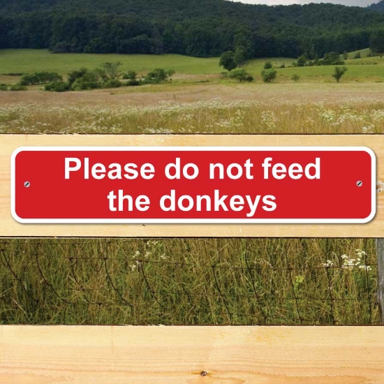 Picture of Please do not feed the donkeys sign 