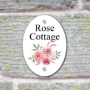 Picture of Rose country house sign plaque.