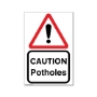 Picture of Caution potholes sign