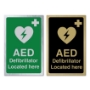 Picture of  AED Defib Located Here Sign - Gold or Silver